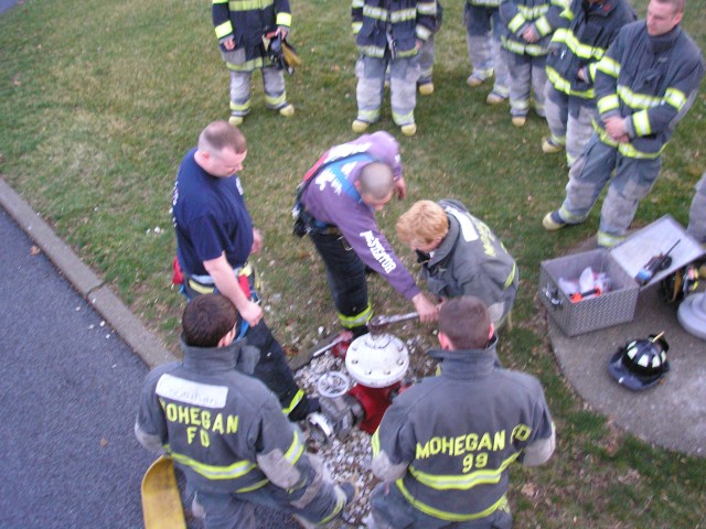 Capt Cerrato Explaining How To Properly Use The Hydrant Wrench
