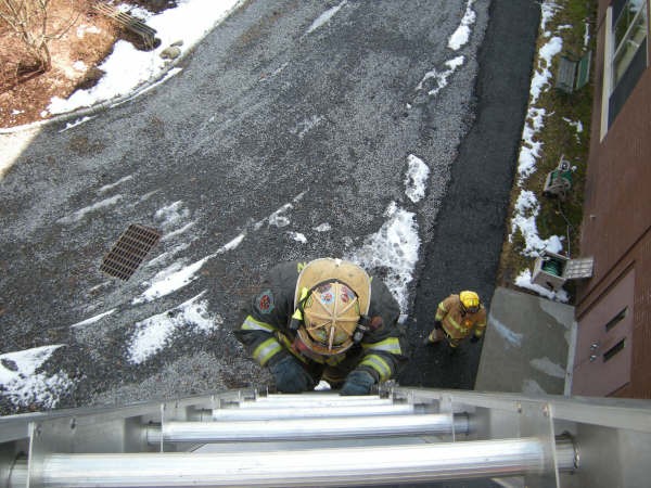 Chief Keesler Decends The Ladder At Blue Mtn. Middle School