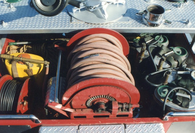 Above The Pump Panel: Indian Tanks, The Booster Hose Reel, And Electric Cord Reel