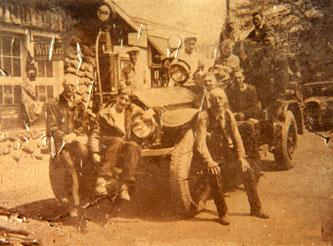 Members on 1922 Engine at  stone garage on Main Street, Mohegan Lake in the 1920s. The photo was taken prior to 1927 -- note the absence of the fire station. (Courtesy of Yorktown Historical Society) 