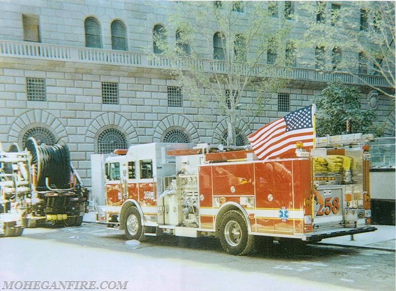 Engine 258 Parked In Front Of The Federal Reserve While Crew Assists at Ground Zero  